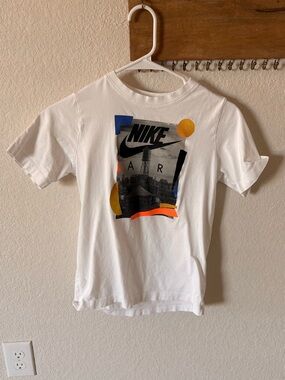 Nike White T-Shirt with Black, Blue, Yellow and Orange Graphic